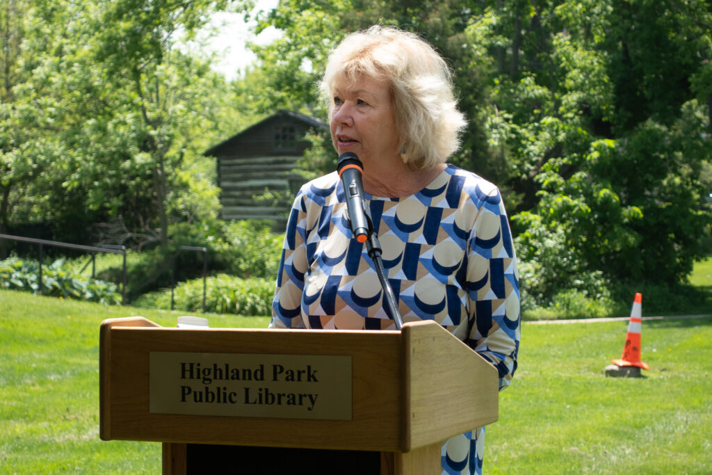 State Senator Julie Morrison speaks at the podium.