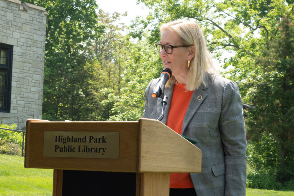 Mayor Nancy Rotering speaks at the podium.