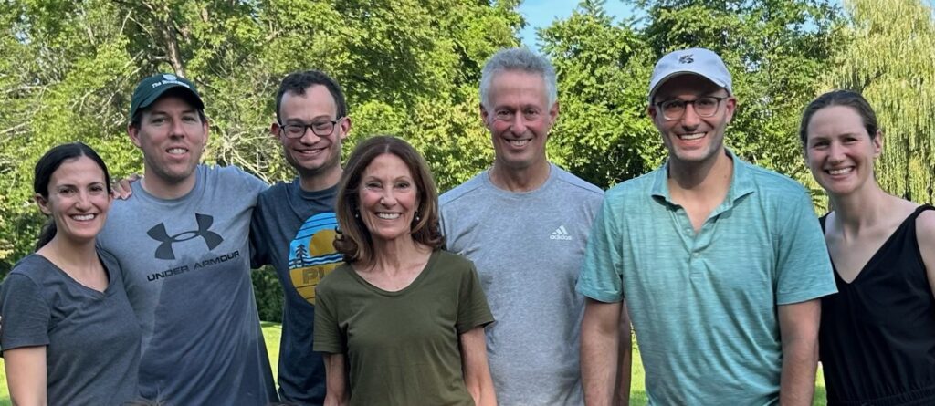 Wide family picture of Robe and Terri Olian with their grown children.
